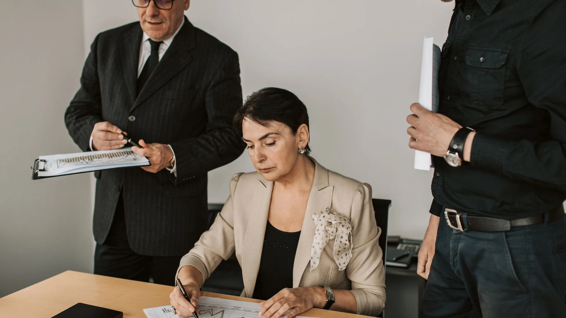 Business partners planning together around an office table